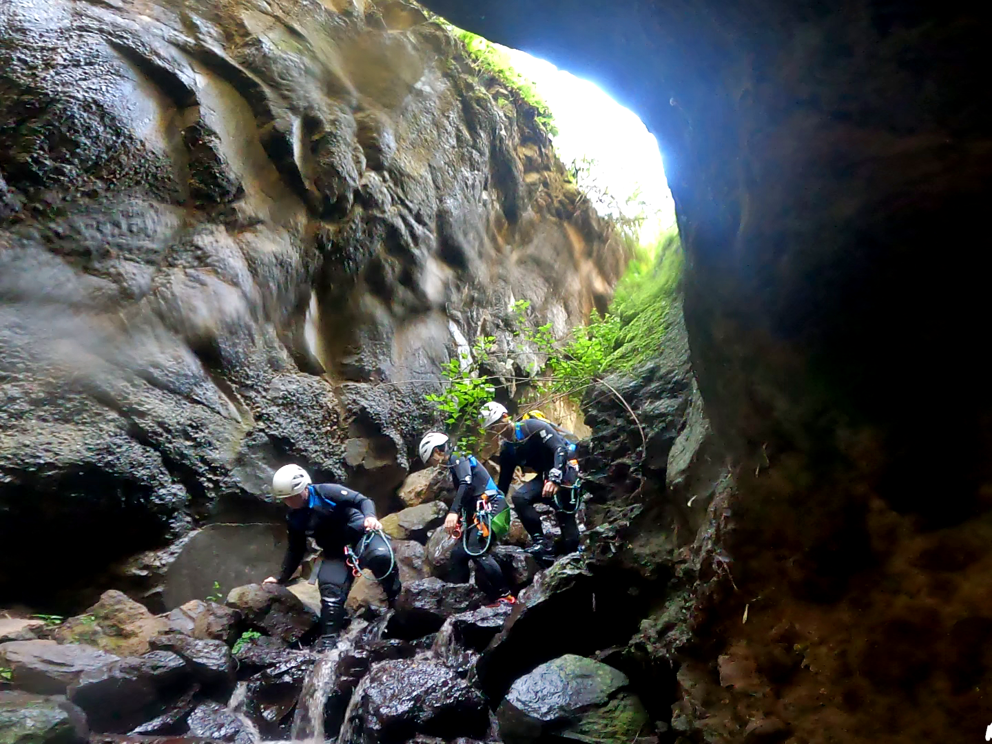 a group of people canyoning