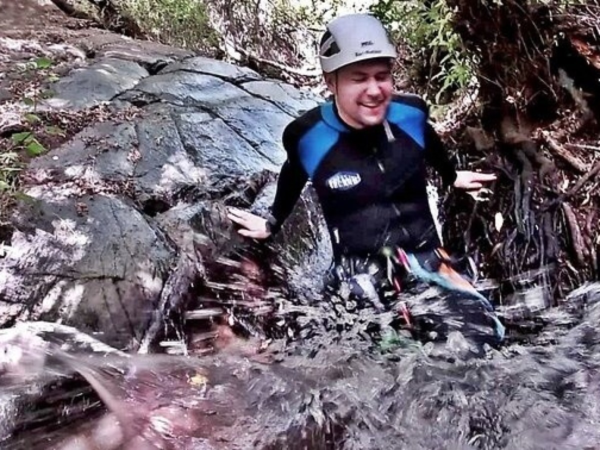 a person canyoning
