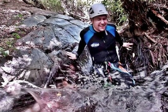 a person canyoning