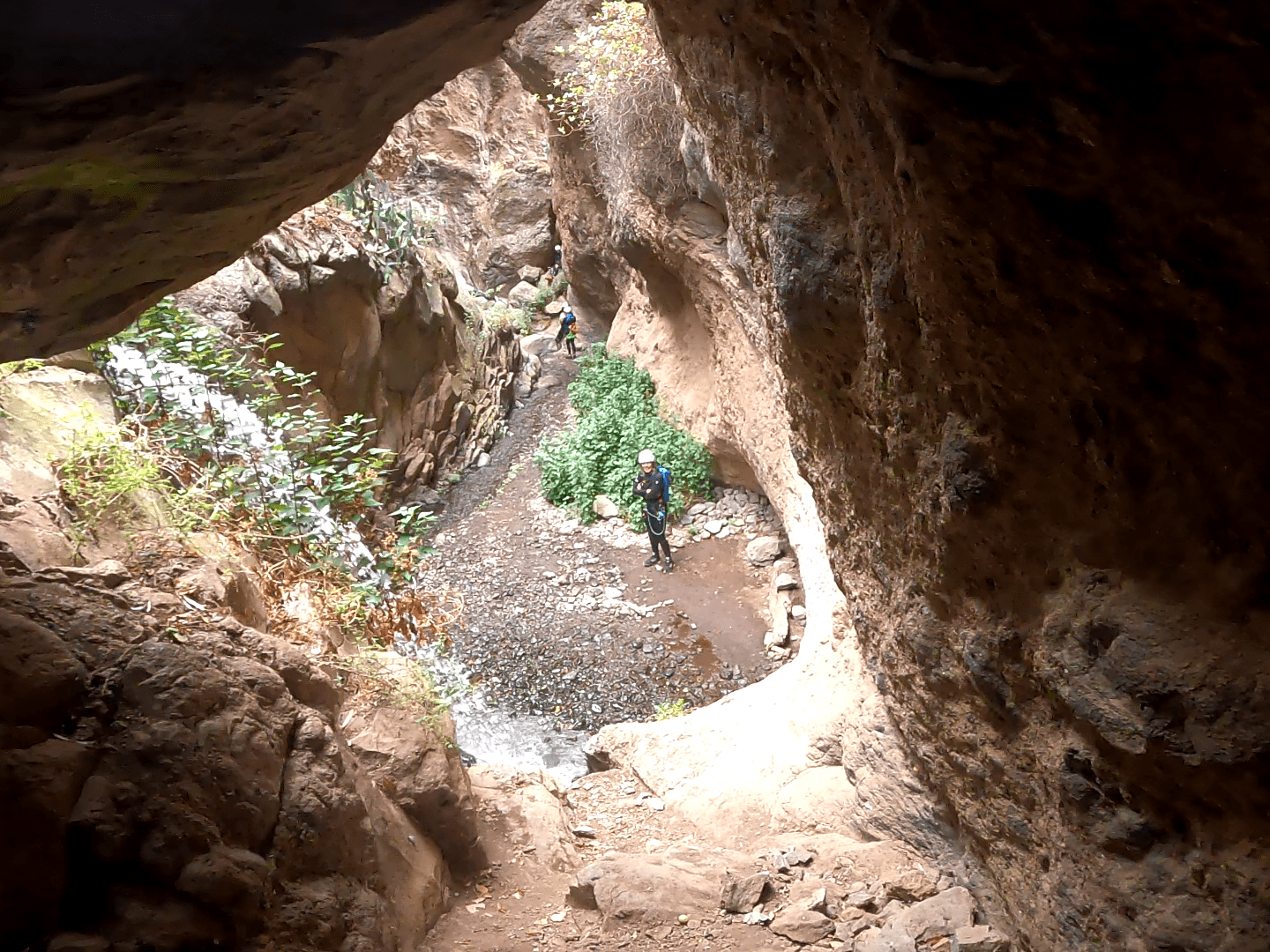 a group of people canyoning