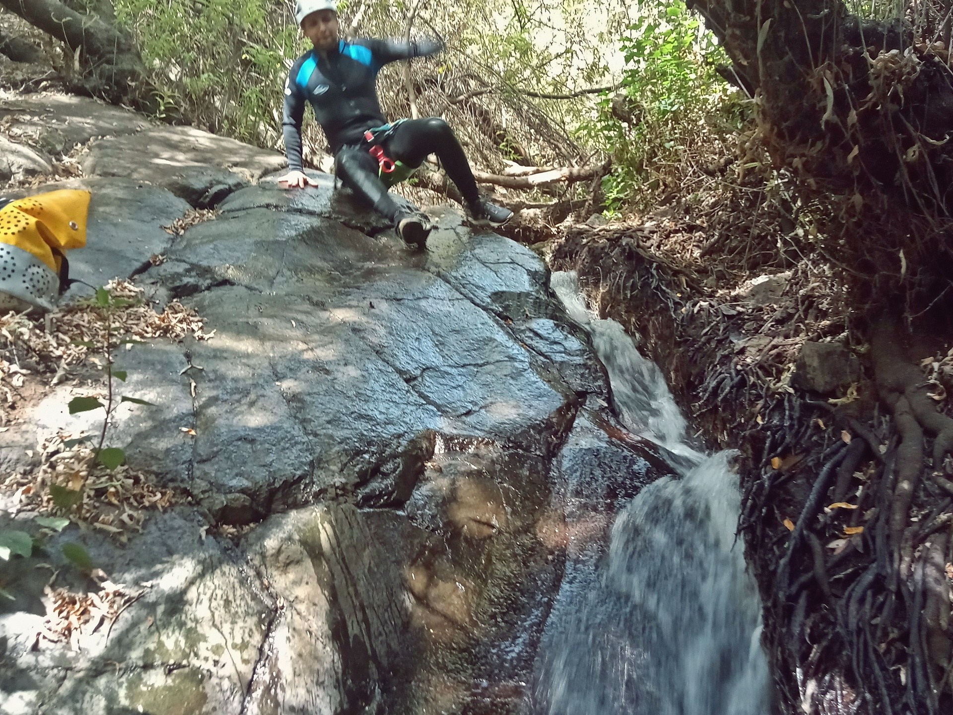 a group of people canyoning