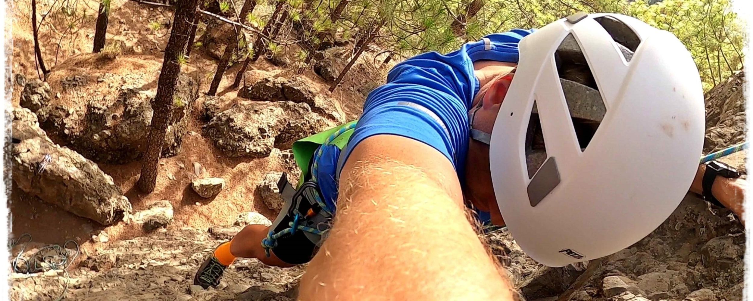 a person climbing a rocky mountain