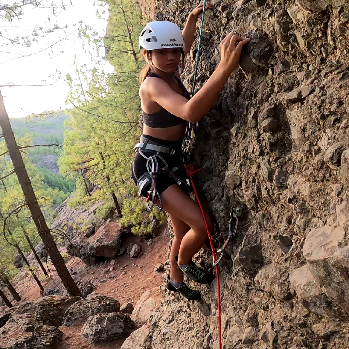 a person standing on a rock
