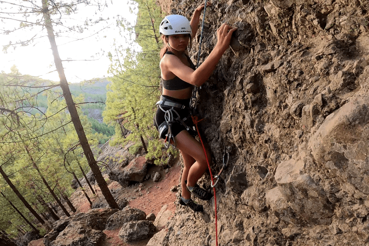 a person standing on a rock