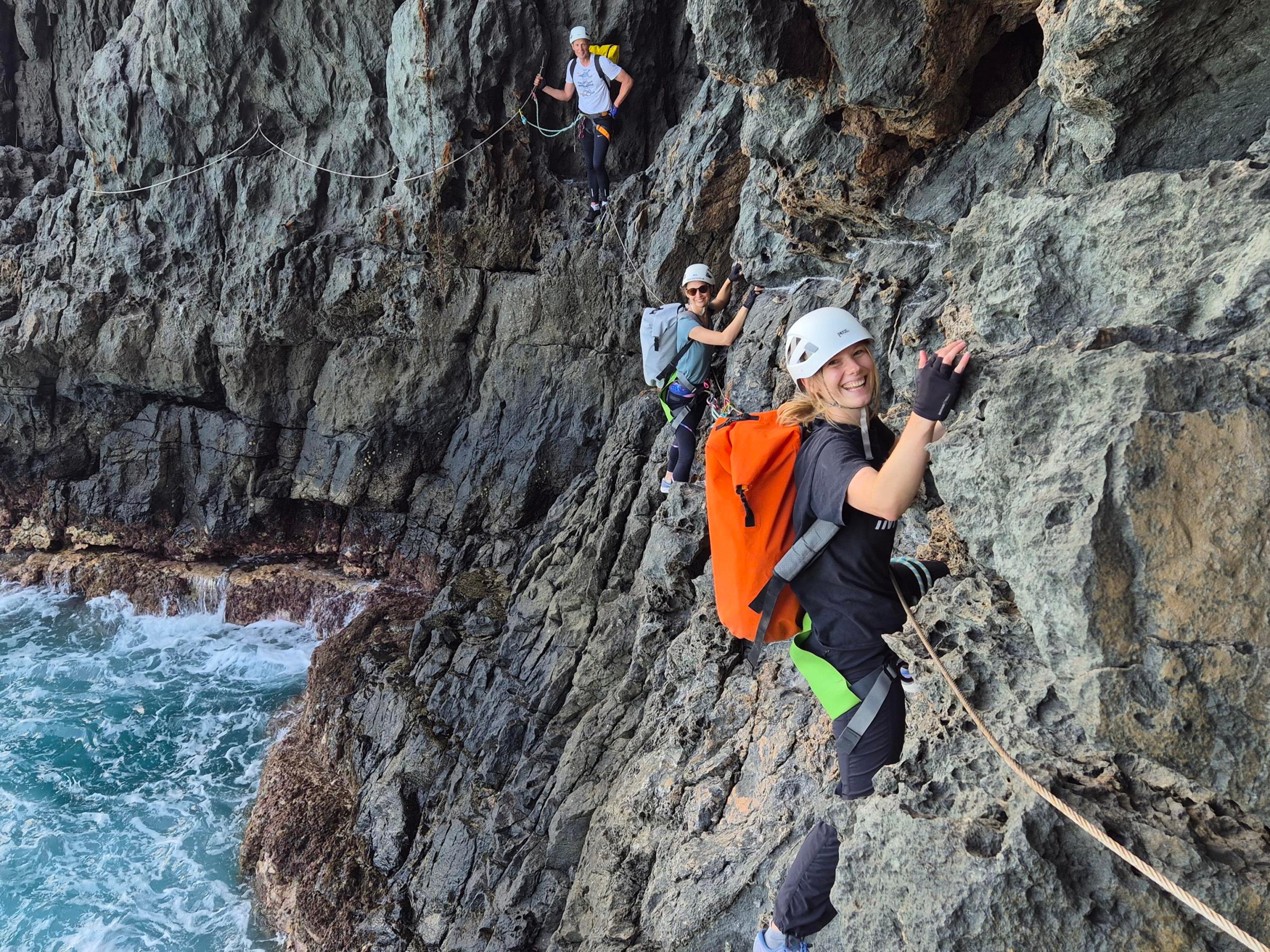 a man riding on top of a rock