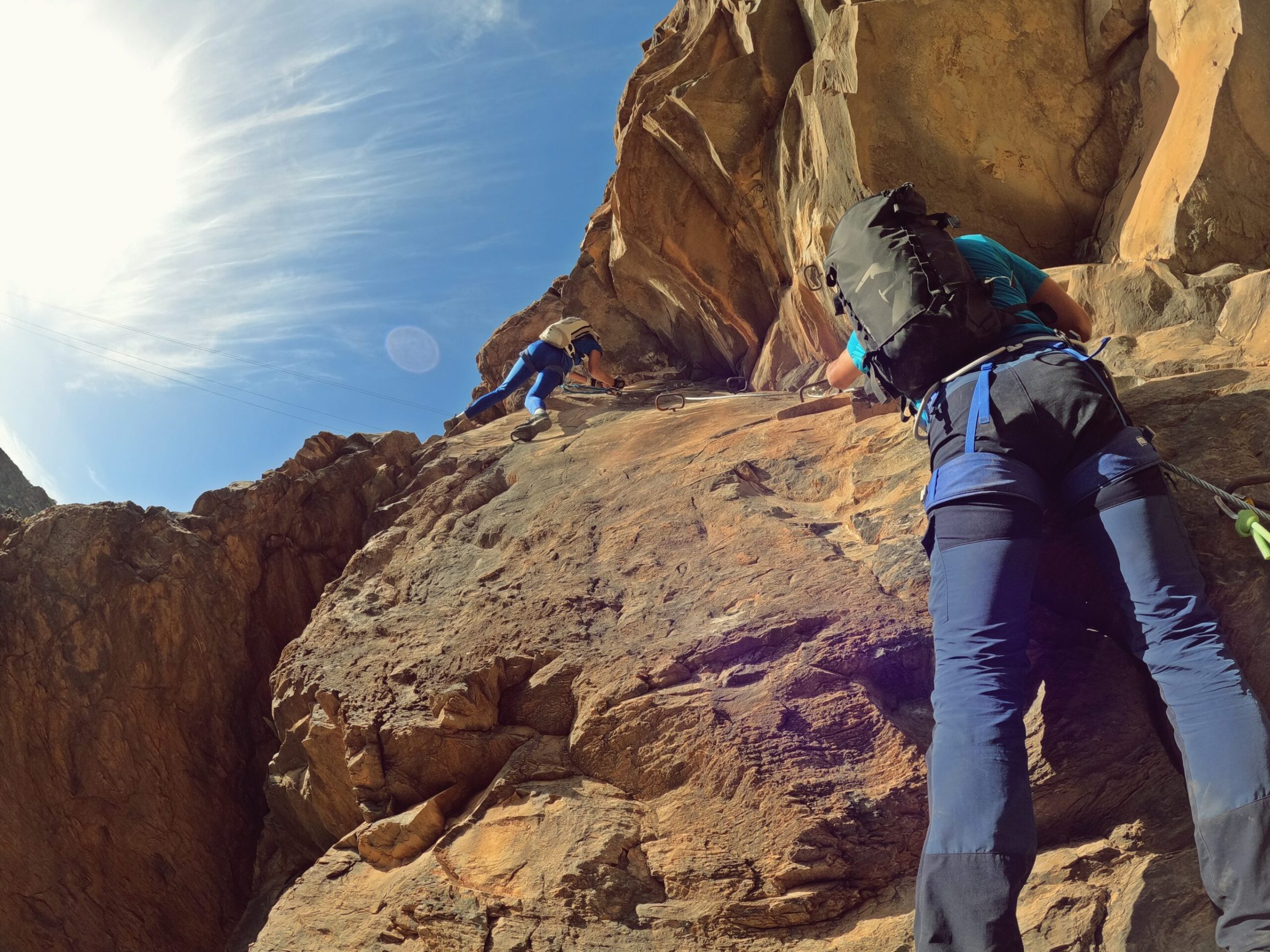 a man standing on a rocky hill