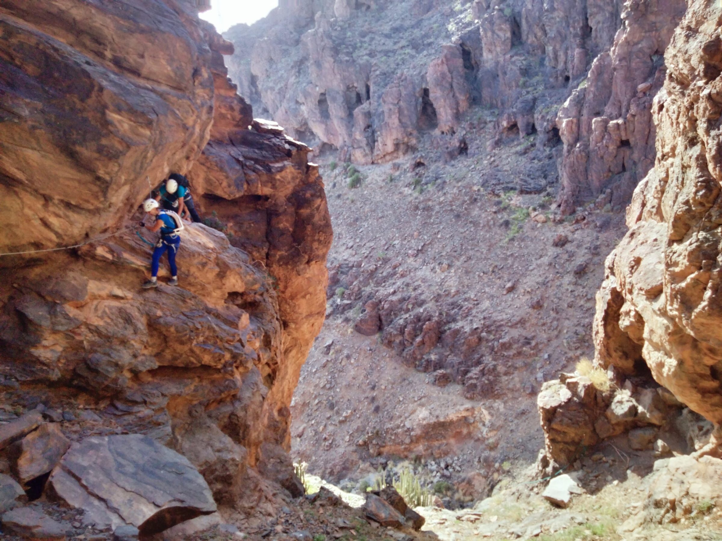 a canyon with a mountain in the background