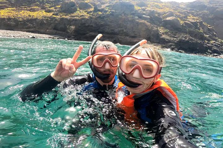 a person swimming in a body of water