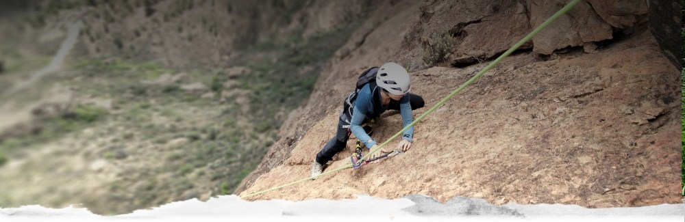 a man riding a skateboard up the side of a mountain